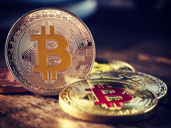 Ethereum and TRON coins representing an ERC20 to TRC20 USDT exchange